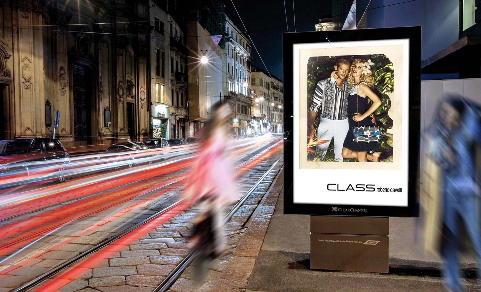 digital out-of-home (DOOH) advertisement for "CLASS Roberto Cavalli"